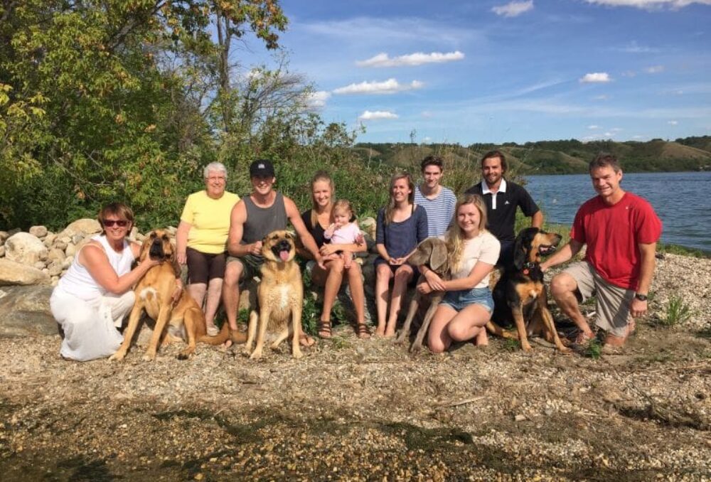 Before naturalization: The MacPherson family (2016) in the location where the naturalization project now supports biodiversity, shoreline stability and nutrient removal