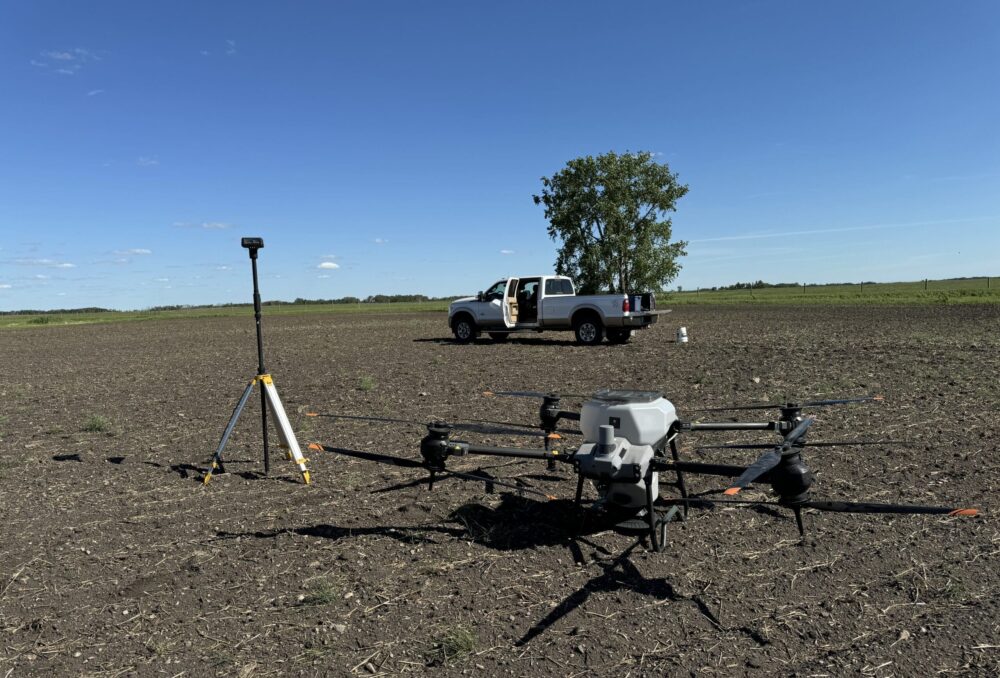 Drone equipped with a spray tank.