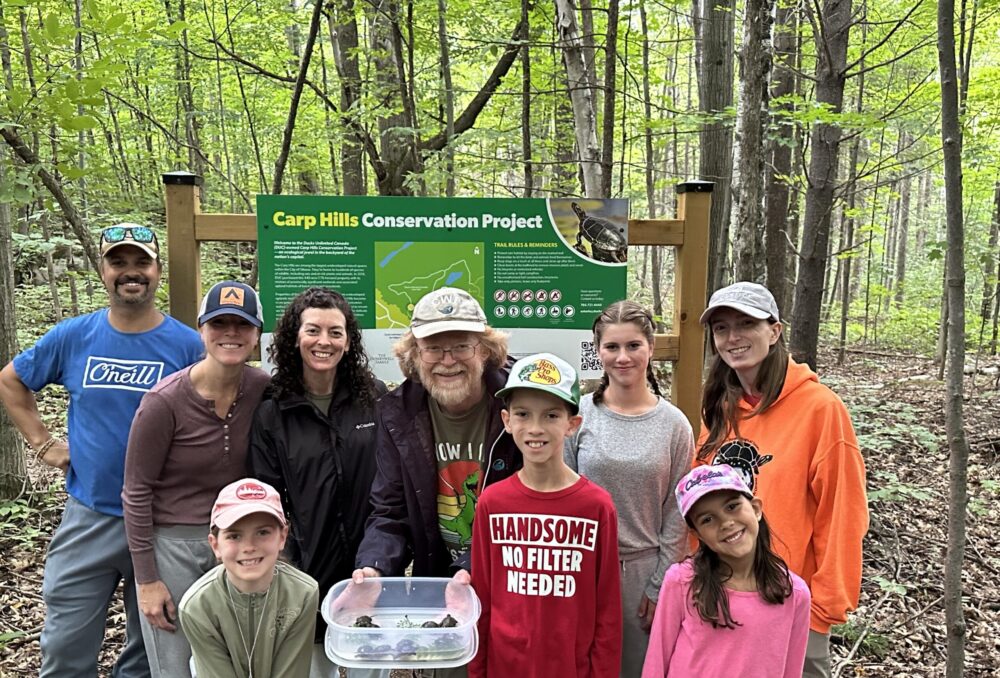 The full group of community members who helped with the turtle hatchlings release in Carp Hills. 