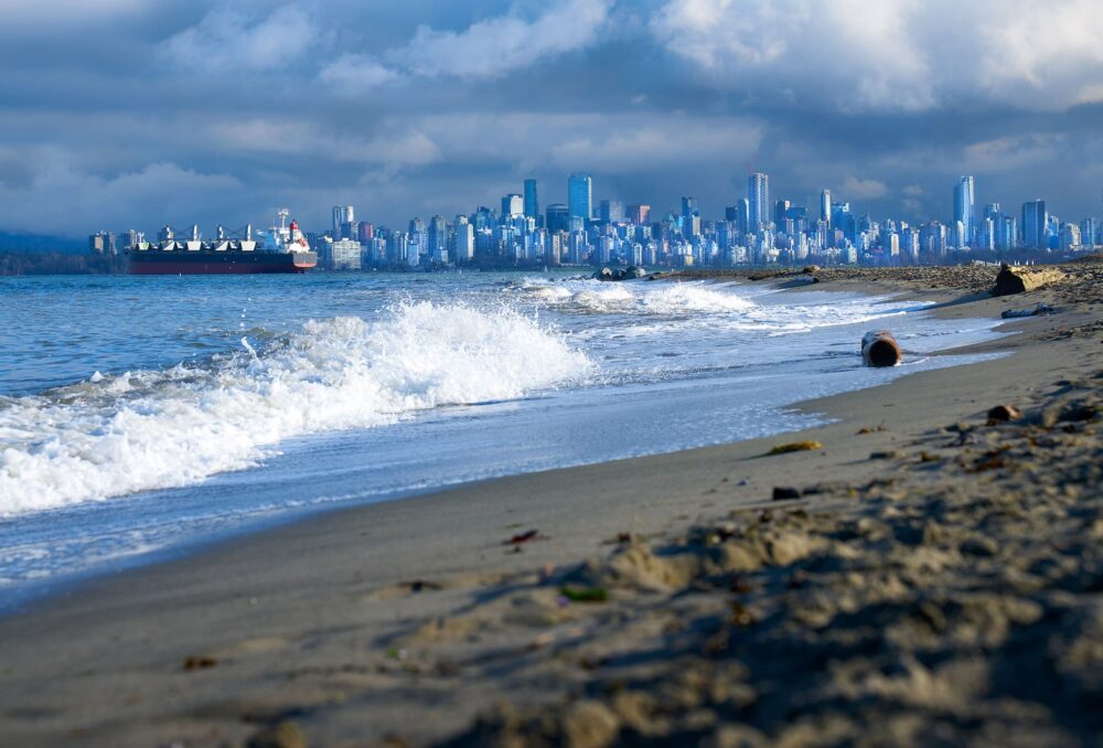 Strong ocean waves strike at the shore along Spanish Banks Beach during a late fall storm in Vancouver, B.C. Nearly a half million Canadians live within five metres of sea level, in communities at risk from extreme weather. 