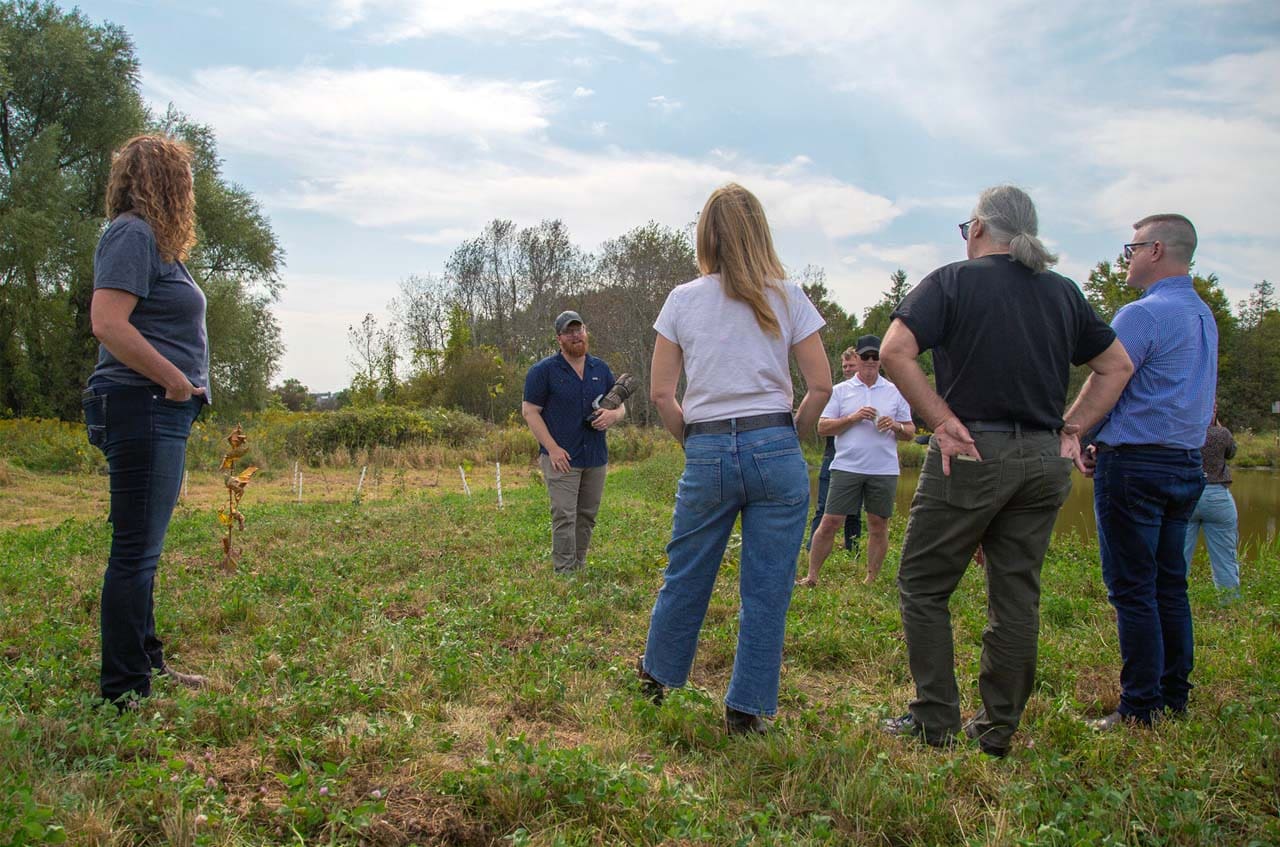 Ducks Unlimited Canada staff members touring and learning about a wetland project in Ontario from Conservation Programs Specialist Nick Krete.